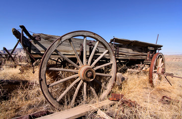 Fototapeta premium Old carts in a Ghost town near Cody, Wyoming