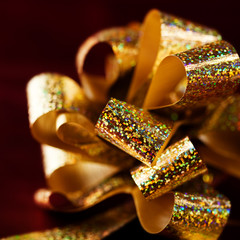 Closeup of golden Christmas Gift Bow
