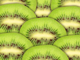 Abstrait vert avec des tranches de kiwi cru