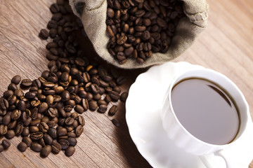 Coffee beans in a cup