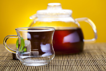 Glass teapot of tea