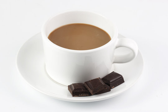 white coffee mug with chocolate bars