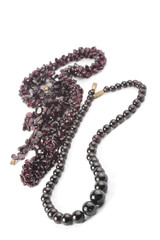 heap of garnet necklaces