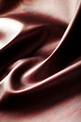 Close-up photo of brown leather ripples