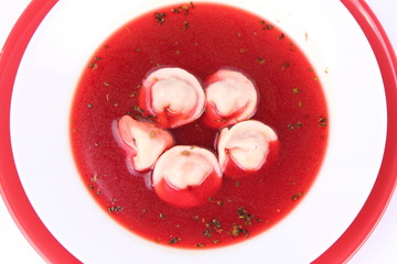 Polish Christmas Eve dish:clear borscht with dumplings (uszka)