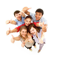 Group of happy joyful friends standing with hands up