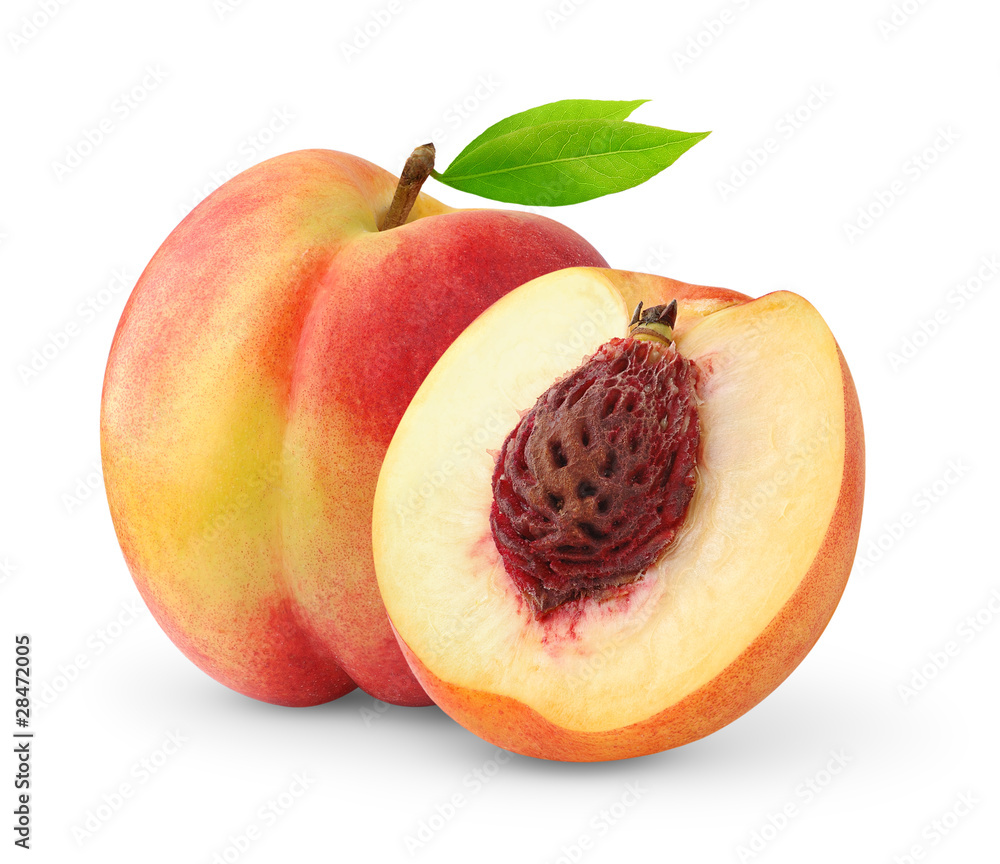 Wall mural Isolated nectarines. One and a half nectarine peaches isolated on white background