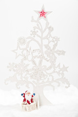 Obraz na płótnie Canvas White Christmas tree and Santa