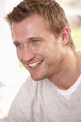 Fototapeta premium Young man poses in studio