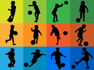 Silhouettes of kids playing soccer © meletver