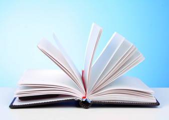 White open book on the table