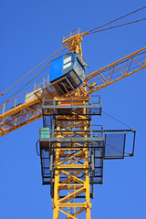 Fototapeta na wymiar tower crane under the blue sky
