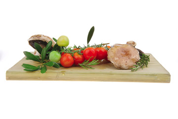 raw vegetables on wooden board