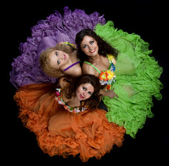 Three woman in color carnival costume