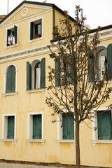 Fototapeta na wymiar Malamocco facades - Foggy day at Venice Lido, Italy
