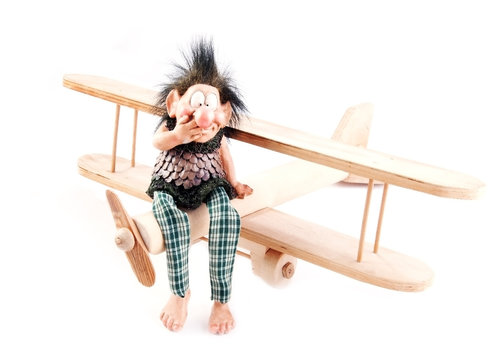 child hand made aircraft and firy tale funny laughing  troll clo