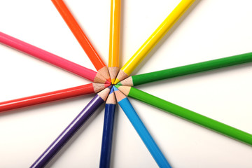 Color pencils forming a star shape