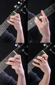 Human hand taking  accord at guitar