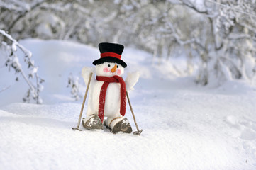snowman skiing in winter landscape