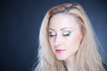 Naklejka premium Blonde with cosmetics;