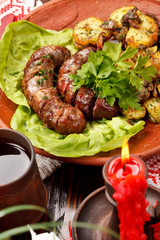 Pork sausages with roasted potatoes