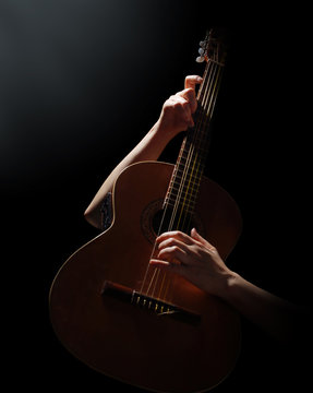 Playing on acoustic guitar