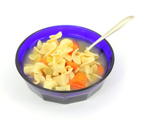Chicken soup and spoon