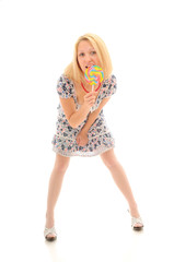 Sexy blonde licking lollipop