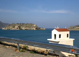 Fototapeta na wymiar Greek small road shrine - In front of Spinalonga island,Crete