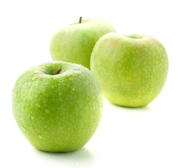 Three ripe green apples
