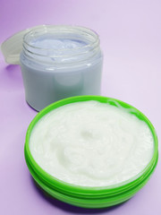 two cosmetic cremes for face