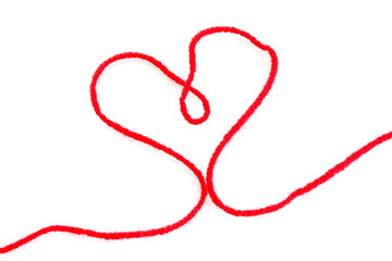 thread of wool in heart shape isolated on white