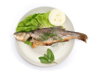 Fried fish with vegetable isolated on white background.