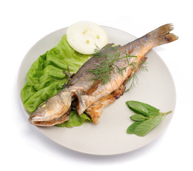 Fried fish with vegetable isolated on white background.