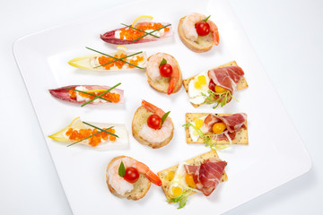 Assorted canapes on tray
