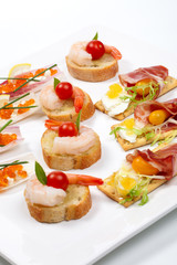 Assorted canapes on tray