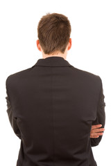 Young business man from back, isolated