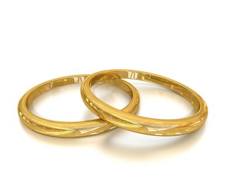 Gold wedding rings on white Background