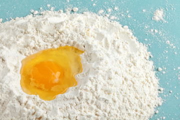 Broken egg on flour, means for making bread