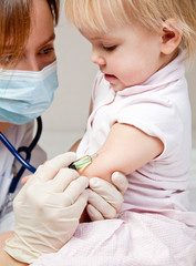 Little girl gets an injection