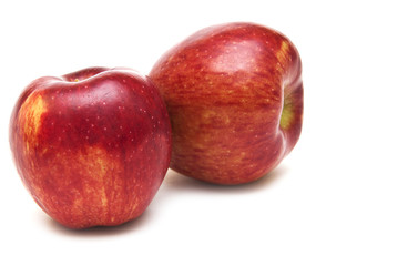two juicy red apples isolated on white