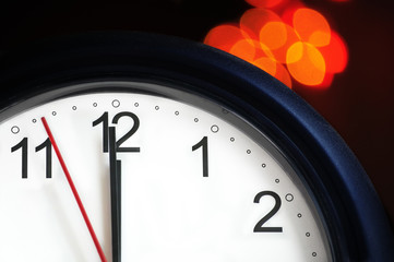 Naklejka na ściany i meble Office clock about to show midnight - few seconds to New Year