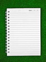 Notebook Paper on green background