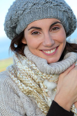 Portrait of beautiful smiling woman in winter