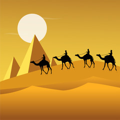 tourists on camels in desert
