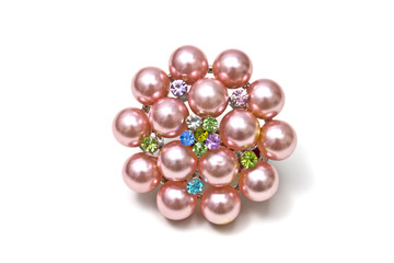 Pink brooch isolated on white