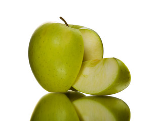 The green apple with the cut off segment