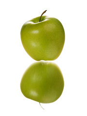 The green apple with reflection, is isolated on a white