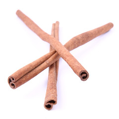 Cinnamon sticks on white background