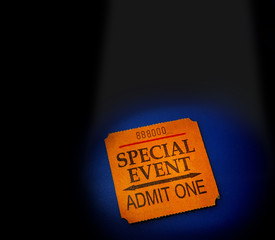 event ticket stub in spotlight, on blue